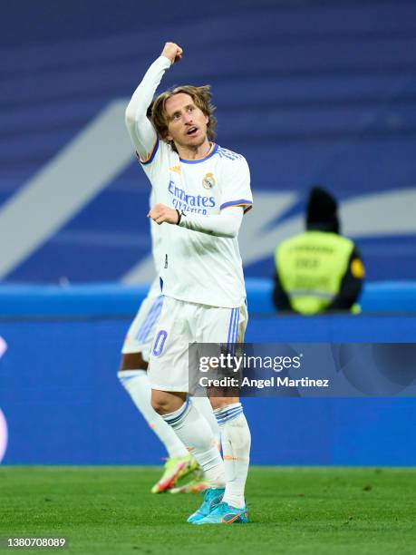 Luka Modric of Real Madrid celebrates after scoring their team's second goal during the LaLiga Santander match between Real Madrid CF and Real...