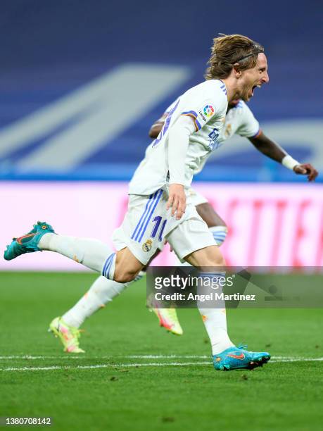 Luka Modric of Real Madrid celebrates after scoring their team's second goal during the LaLiga Santander match between Real Madrid CF and Real...