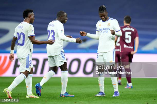 Eduardo Camavinga of Real Madrid celebrates with Ferland Mendy and Vinicius Junior after scoring their team's first goal during the LaLiga Santander...