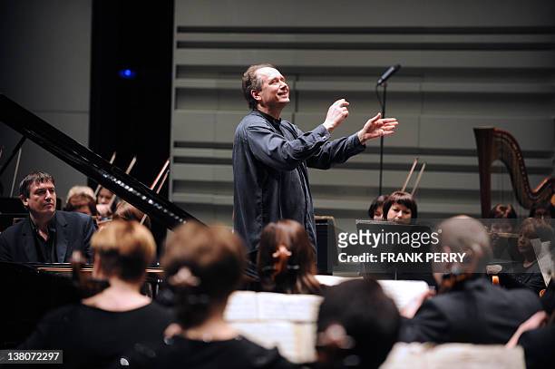 Russian Dmitri Liss conducts the Ural Philharmonic Orchestra and Russian pianist Boris Berezovsky , in Nantes, western France on February 1 during...