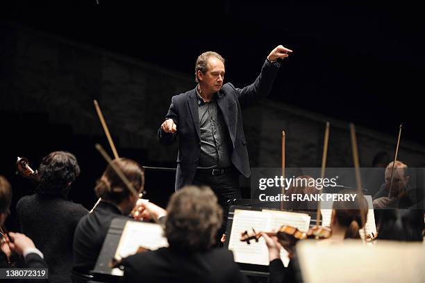 Members of the Ural Philharmonic Orchestra, conducted by Russian Dmitri Liss , participate in a rehearsal before their performance in Nantes, western...