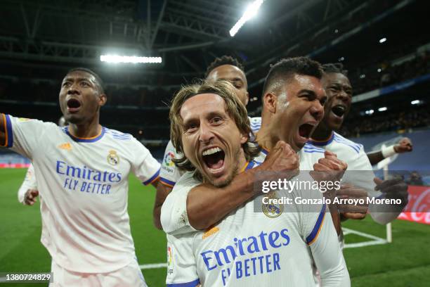 Luka Modric of Real Madrid CF celebrates scoring their second goal with teammate Carlos Casemiro Eduardo Camavinga and David Alaba during the LaLiga...