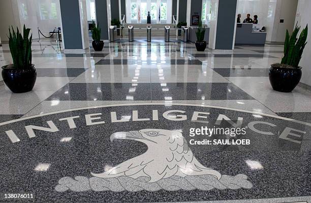 The Central Intelligence Agency logo is displayed in the lobby of CIA Headquarters in Langley, Virginia, on August 14, 2008. AFP PHOTO/SAUL LOEB