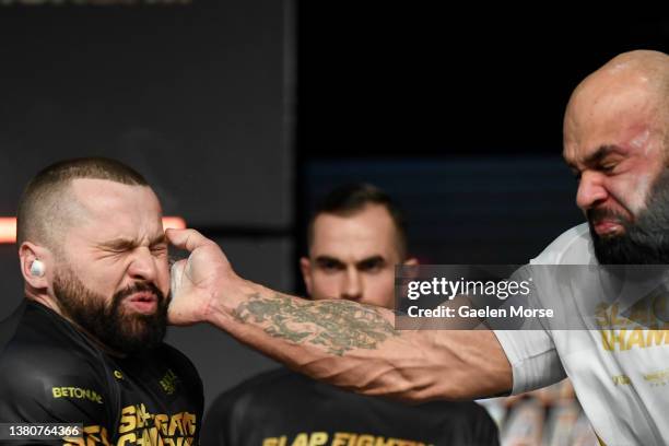 Karol “Pikolo” Wyłupek slaps Pater “Aligator” Truchlik during the Slap Fighting Championships at the Arnold Sports Festival in Columbus Convention...