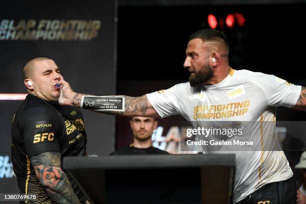 Maksymilian “Mad Max” Leśniak slaps Nikolas “Predator” Toth during the Slap Fighting Championships at the Arnold Sports Festival in Columbus...