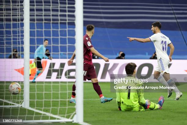 Marco Asensio of Real Madrid CF celebrates scoring their fourth goal during the LaLiga Santander match between Real Madrid CF and Real Sociedad at...