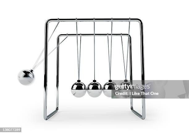 newton's cradle with one ball falling to group - newtons cradle stock pictures, royalty-free photos & images
