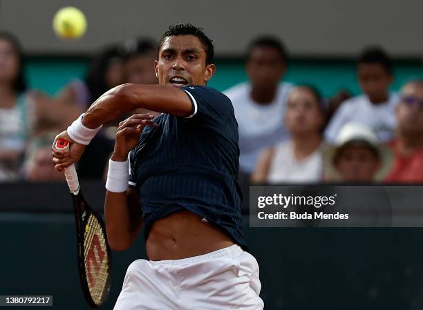 Thiago Monteiro of Brazil returns a shot against Alexander Zverev of Germany during their singles match on Day Two of the 2022 Davis Cup Qualifier at...
