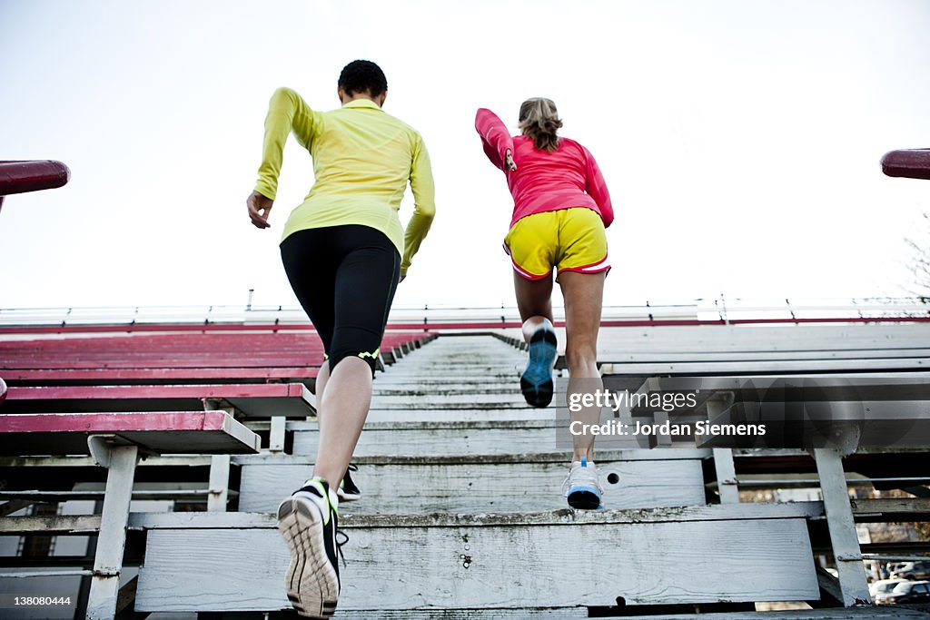 Two women exercising.