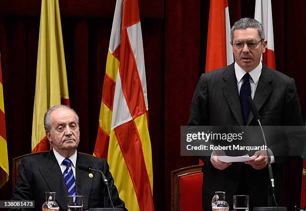 King Juan Carlos of Spain and the Minister of Justice of Spain Alberto Ruiz Gallardon attend a commemoration ceremony for the 'XX Aniversario de la...