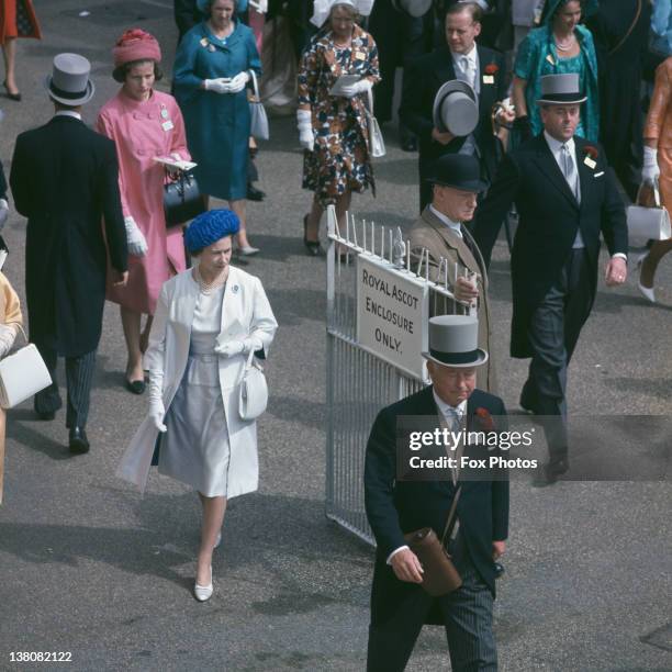 Queen Elizabeth II leaving the Royal enclosure at Ascot Racecourse, Berkshire, June 1963.