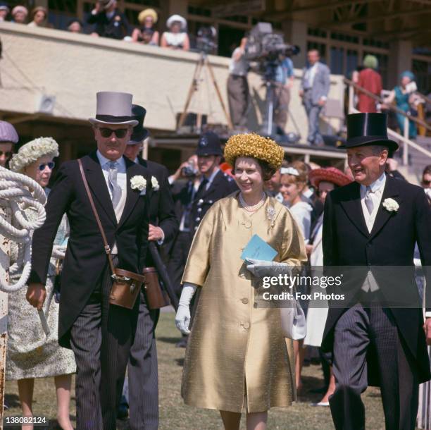 Queen Elizabeth II at Epsom Downs Racecourse for the Oaks Stakes, Surrey, 8th June 1962.