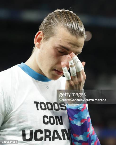 Ukranian goalkeeper Andriy Lunin of Real Madrid CF reacts during the tribute in support of his country prior to start the LaLiga Santander match...