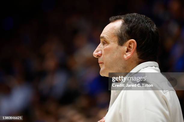 Head coach Mike Krzyzewski of the Duke Blue Devils looks on during the national anthem prior to a game against the North Carolina Tar Heels at...