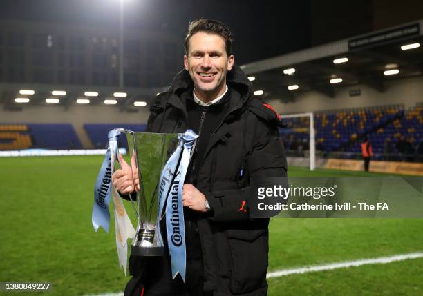 Gareth Taylor, Manager of Manchester City celebrates with The FA Women's Continental Tyres League Cup trophy following their side's victory in the FA...