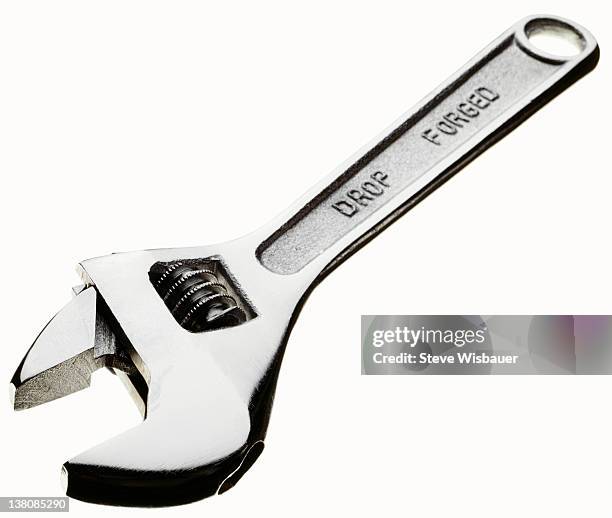 a silver adjustable crescent wrench - adjustable wrench stock pictures, royalty-free photos & images