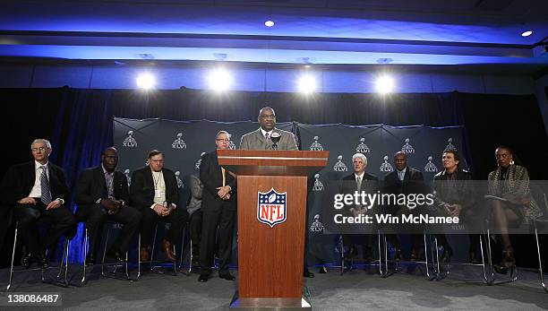 Former New York Giants defensive linemen George Martin speaks at the podium during a press conference held by the NFL Alumni Association at the Super...