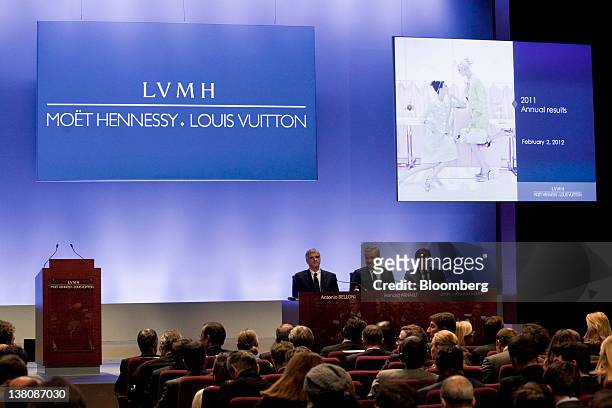 Antonio Belloni, managing director of LVMH Moet Hennessy Louis Vuitton SA, left, Bernard Arnault, chairman and chief executive officer of LVMH Moet...