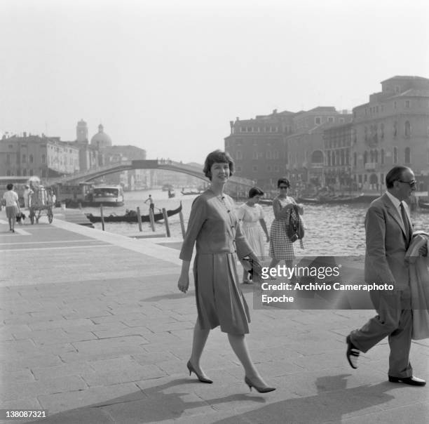 American actress Betsy Blair portrayed while walking outside the railway station, Venice, 1960.
