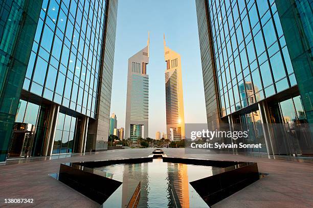 dubai, emirates towers - emirates towers stock pictures, royalty-free photos & images