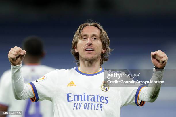 Luka Modric of Real Madrid CF celebrates scoring their second goal during the LaLiga Santander match between Real Madrid CF and Real Sociedad at...