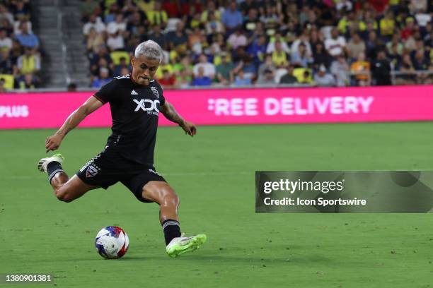 United midfielder Andy Najar takes a shot during a match between Nashville SC and D.C. United, July 1, 2023 at GEODIS Park in Nashville, Tennessee.