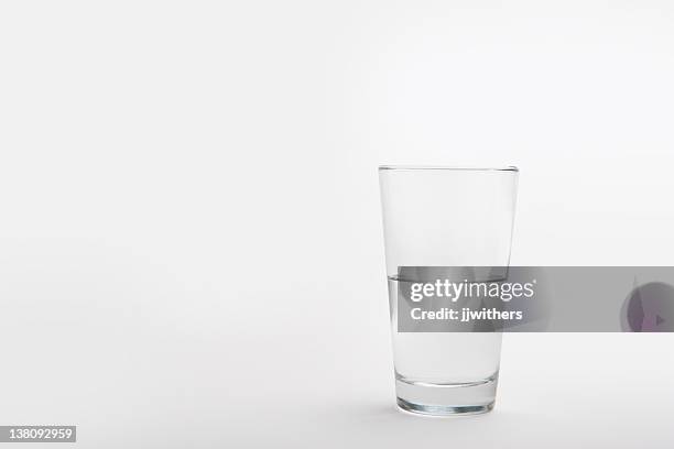 pint glass half full - half and half stock pictures, royalty-free photos & images