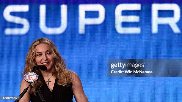 Singer Madonna appears during a press conference for the Bridgestone Super Bowl XLVI halftime show at the Super Bowl XLVI Media Center in the J.W....