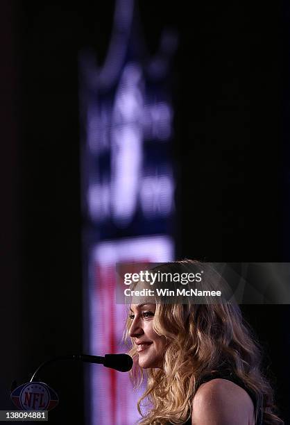 Singer Madonna appears during a press conference for the Bridgestone Super Bowl XLVI halftime show at the Super Bowl XLVI Media Center in the J.W....