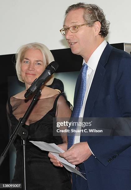 Sarah Baxter and John Witherow attend the Sunday Times Magazine 50th Anniversary Party at Saatchi Gallery on February 2, 2012 in London, England.