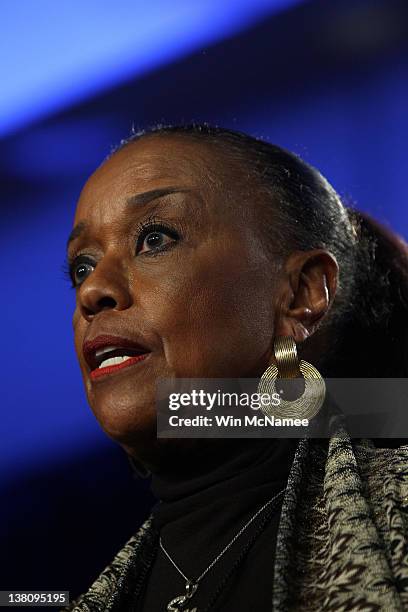 Sylvia Mackey speaks at the podium during a press conference held by the NFL Alumni Association at the Super Bowl XLVI Media Center in the J.W....