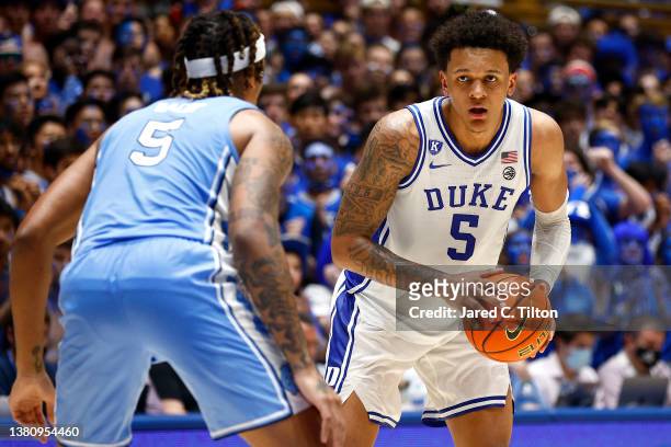 Armando Bacot of the North Carolina Tar Heels guards Paolo Banchero of the Duke Blue Devils during the second half at Cameron Indoor Stadium on March...