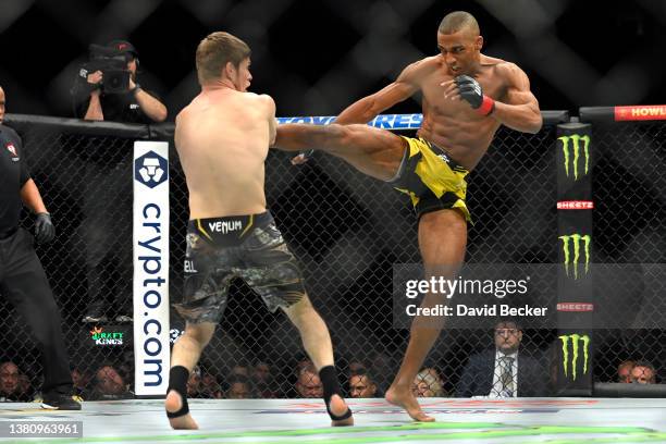 Bryce Mitchell and Edson Barboza of Brazil fight in their featherweight fight during UFC 272 at T-Mobile Arena on March 05, 2022 in Las Vegas, Nevada.