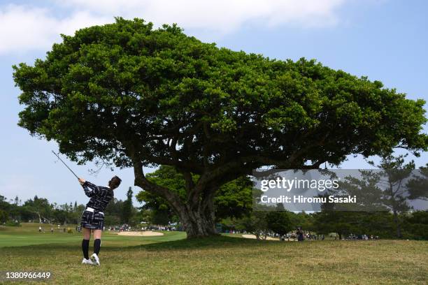 Yuna Nishimura of Japan hits her second shot on the 15th hole during the final round of the Daikin Orchid Ladies at Ryukyu Golf Club on March 6, 2022...