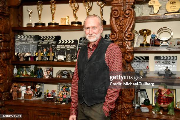 Producer/director Brian Henson poses with some of his awards prior to a performance of Henson Alternative's "PUPPET UP! – UNCENSORED" comedy puppet...