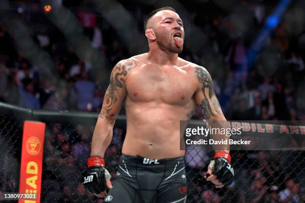 Colby Covington gestures to Jorge Masvidal after their welterweight fight during UFC 272 at T-Mobile Arena on March 05, 2022 in Las Vegas, Nevada.