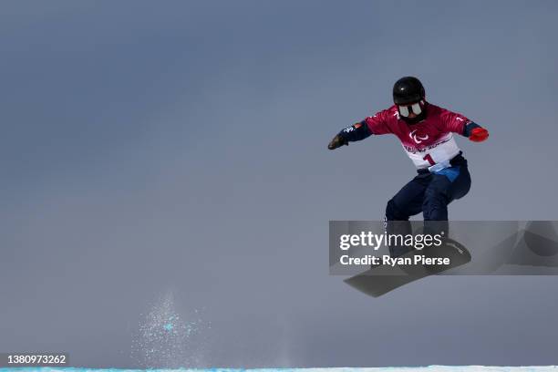 James Barnes-Miller of Team Great Britain competes during the Men's Snowboard Cross SB-UL Qualification during day two of the Beijing 2022 Winter...