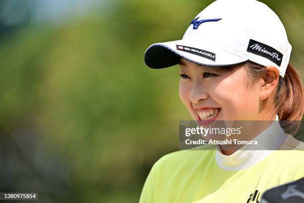 Mao Saigo of Japan smiles after holing out on the 18th green during the final round of the Daikin Orchid Ladies at Ryukyu Golf Club on March 6, 2022...