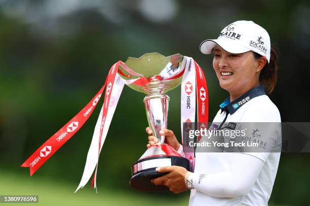 Jin Young Ko of South Korea celebrates with the HSBC Women's World Championship trophy after winning during the Final Round of the HSBC Women's World...