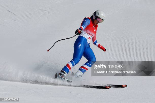 Marie Bochet of Team France reacts in the Para Alpine Skiing Women's Super-G Standing during day two of the Beijing 2022 Winter Paralympics at...