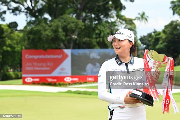 Jin Young Ko of South Korea poses with the HSBC Women's World Championship trophy as she celebrates after winning during the Final Round of the HSBC...