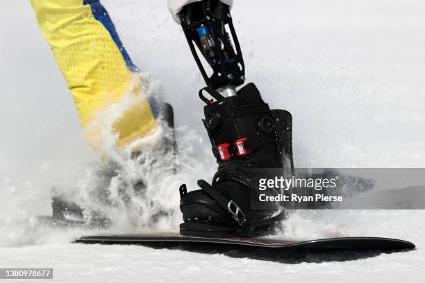 Andre Barbieri of Team Brazil competes during the Men's Snowboard Cross SB-LL1 Qualification during day two of the Beijing 2022 Winter Paralympics at...