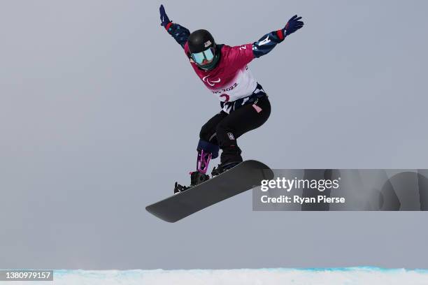 Brenna Huckaby of Team United States competes during the Women's Snowboard Cross SB-LL2 Qualification during day two of the Beijing 2022 Winter...