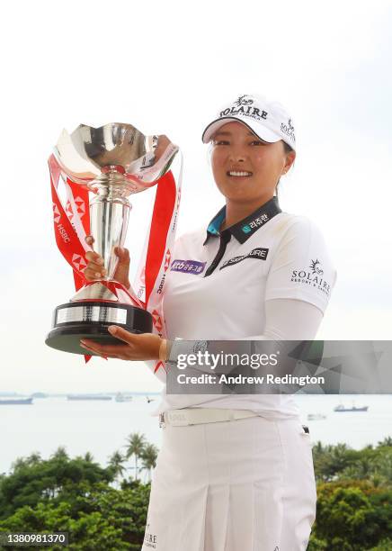 Jin Young Ko of South Korea poses with the HSBC Women's World Championship trophy as she celebrates after winning during the Final Round of the HSBC...