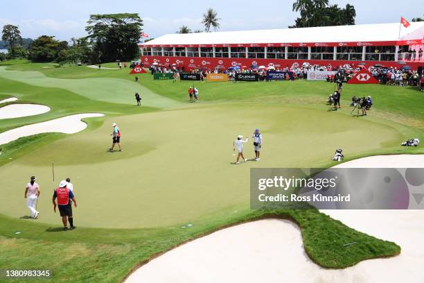 General view of the eighteenth green Jin Young Ko of South Korea celebrates with her caddie David Brooker after putting in for a birdie to win during...