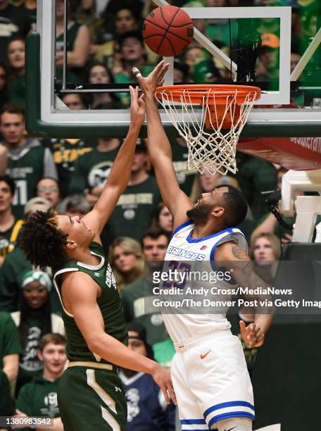 Colorado State Rams guard John Tonje makes a basket against Boise State Broncos forward Naje Smith in the first half at Moby Arena March 05, 2022....