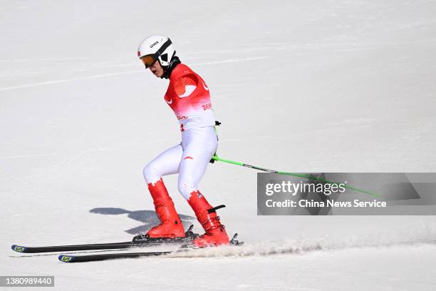 Liang Jingyi of Team China competes during the Para Alpine Skiing Men's Super-G Standing on day two of the Beijing 2022 Winter Paralympics at Yanqing...