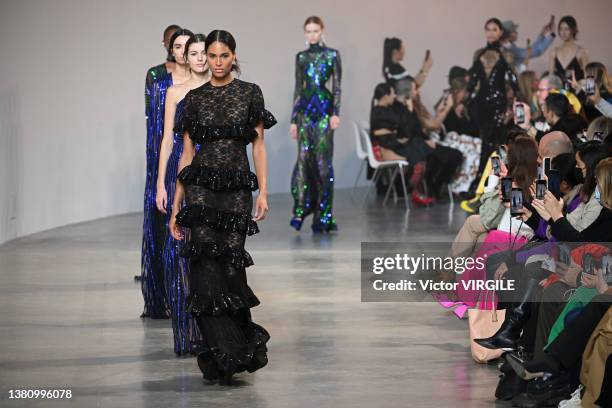 Cindy Bruna walks the runway during the Elie Saab Ready to Wear Fall/Winter 2022-2023 fashion show as part of the Paris Fashion Week on March 5, 2022...