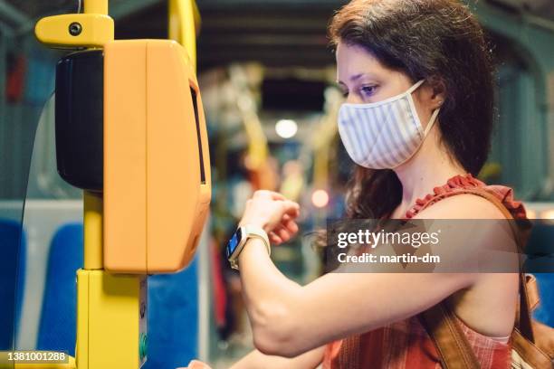 tourist buying tickets with contactless payment - validation stock pictures, royalty-free photos & images