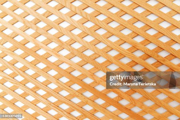 wooden lattice made of natural materials handmade. natural tree. crate. home interior. white background. natural interior. - a parallelogram stock-fotos und bilder